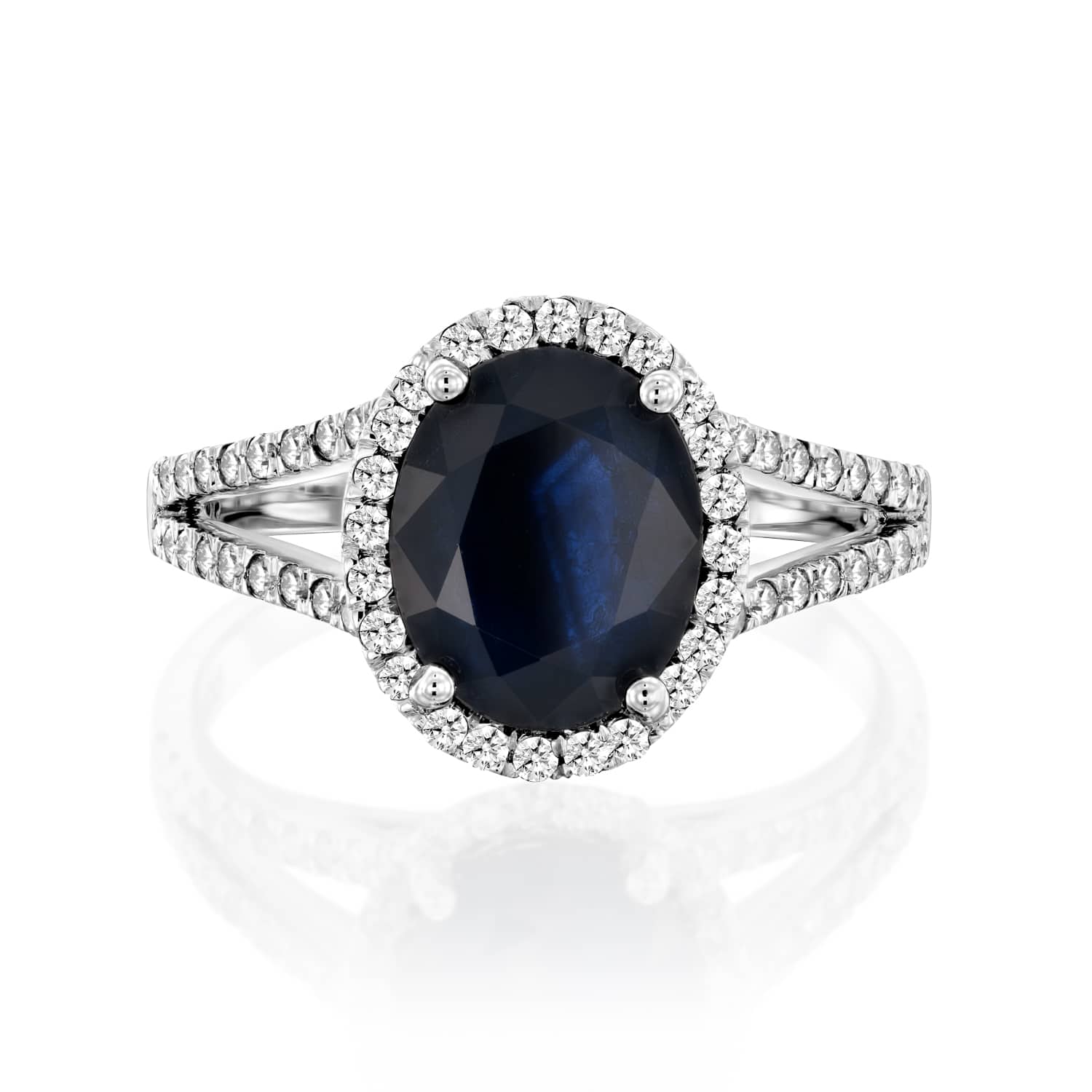 טבעת זהב לבן עם אבן ספיר כחולה ויהלומים